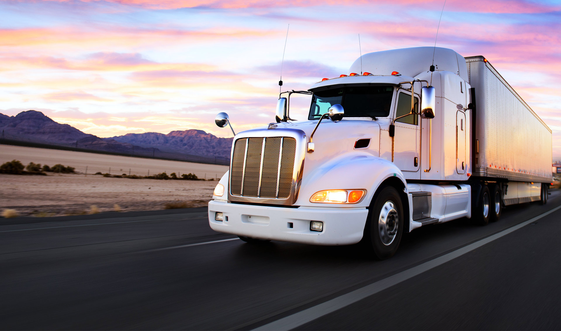 image of a white truck in the road